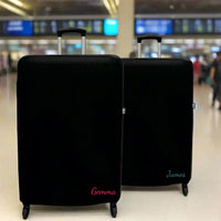Black Medium Suitcase Cover with personalised name with the option of Rose Gold, White, Bright Pink, Bright Yellow, Teal Blue and Gold font on the front and/or back