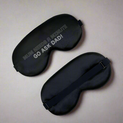 Funny Gift For Mum Travel Eye Mask with text ' Mum needs a minute go ask dad! ' Black mask with other colours available 
