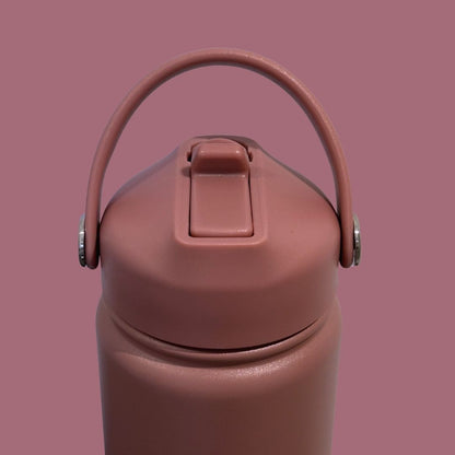 Kids water bottle easy-sip straw lid handle up front view on dusky rose pink Grip bottle 