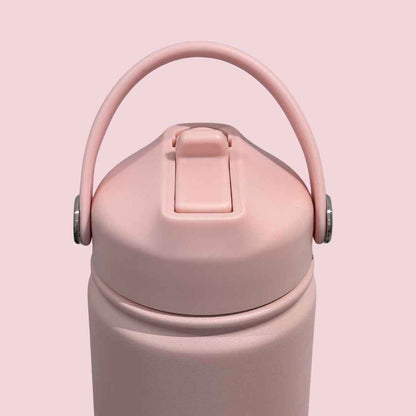 Kids water bottle easy-sip straw lid with handle up front view on baby pink Grip bottle 
