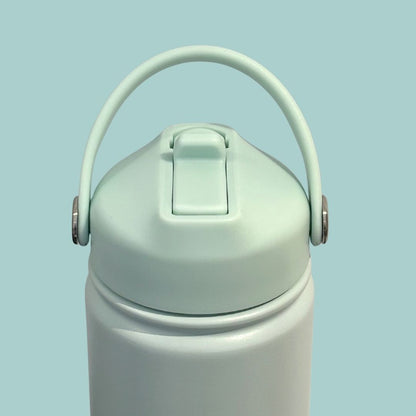Kids water bottle easy-sip straw lid soft handle up front view on turquoise blue Grip bottle 