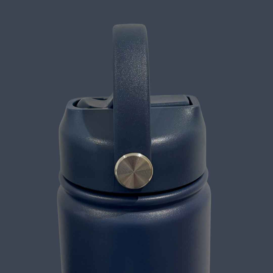 Kids water bottle easy-sip straw lid with handle on navy blue Grip bottle side view
